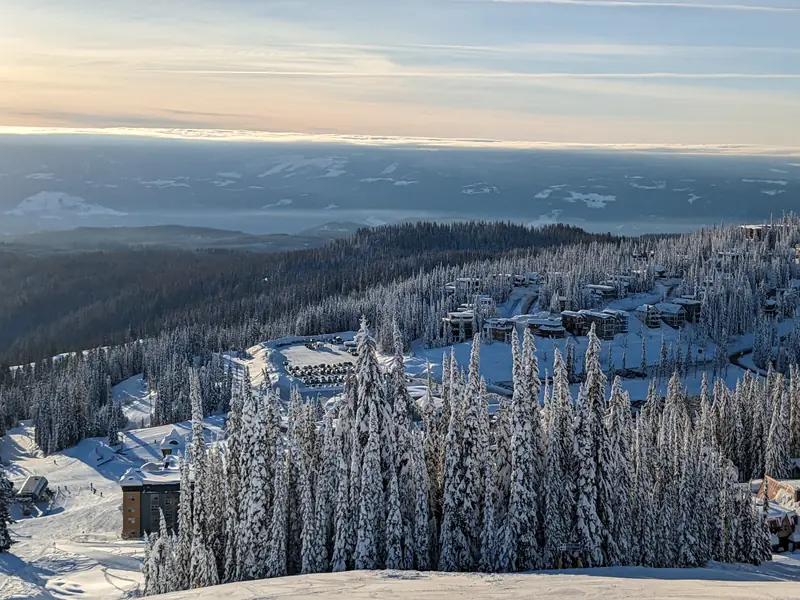 Mountain homes tucked into snowy trees at SilverStar
