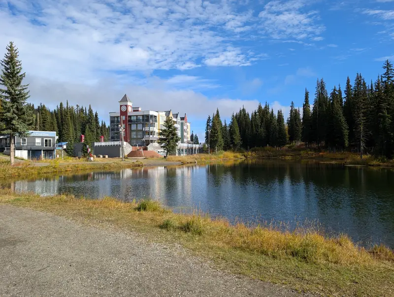 Walking path beside a pond in SilverStar village
