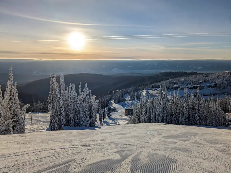 Sun over the valley cloud from a SilverStar run